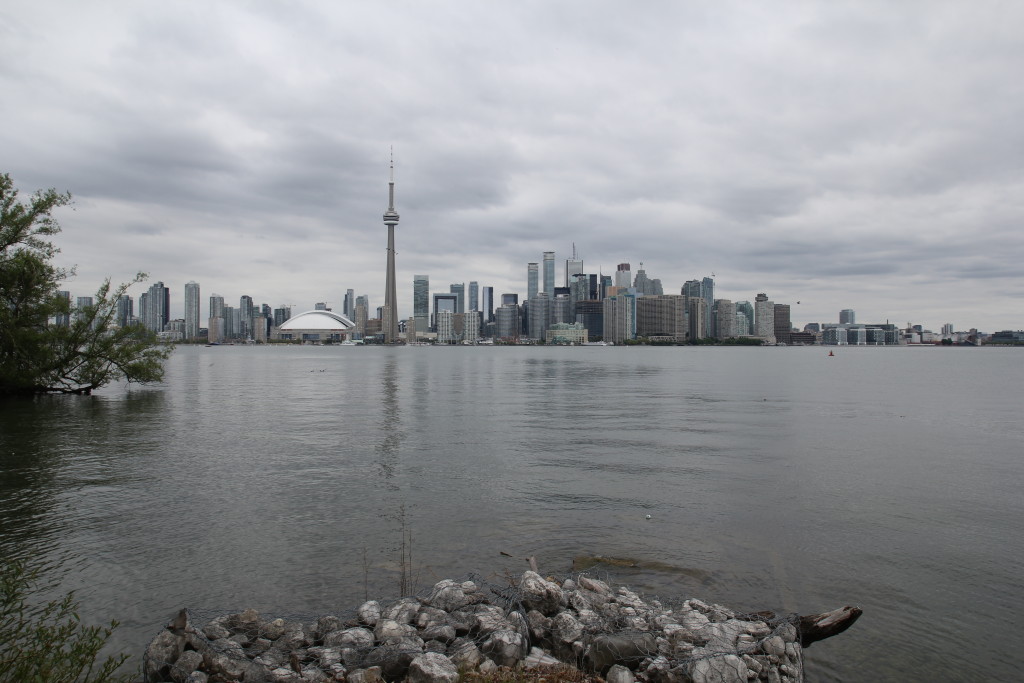 View of Toronto skyline from Central Island which has gardens, bike and boat rentals and a nude beach. 